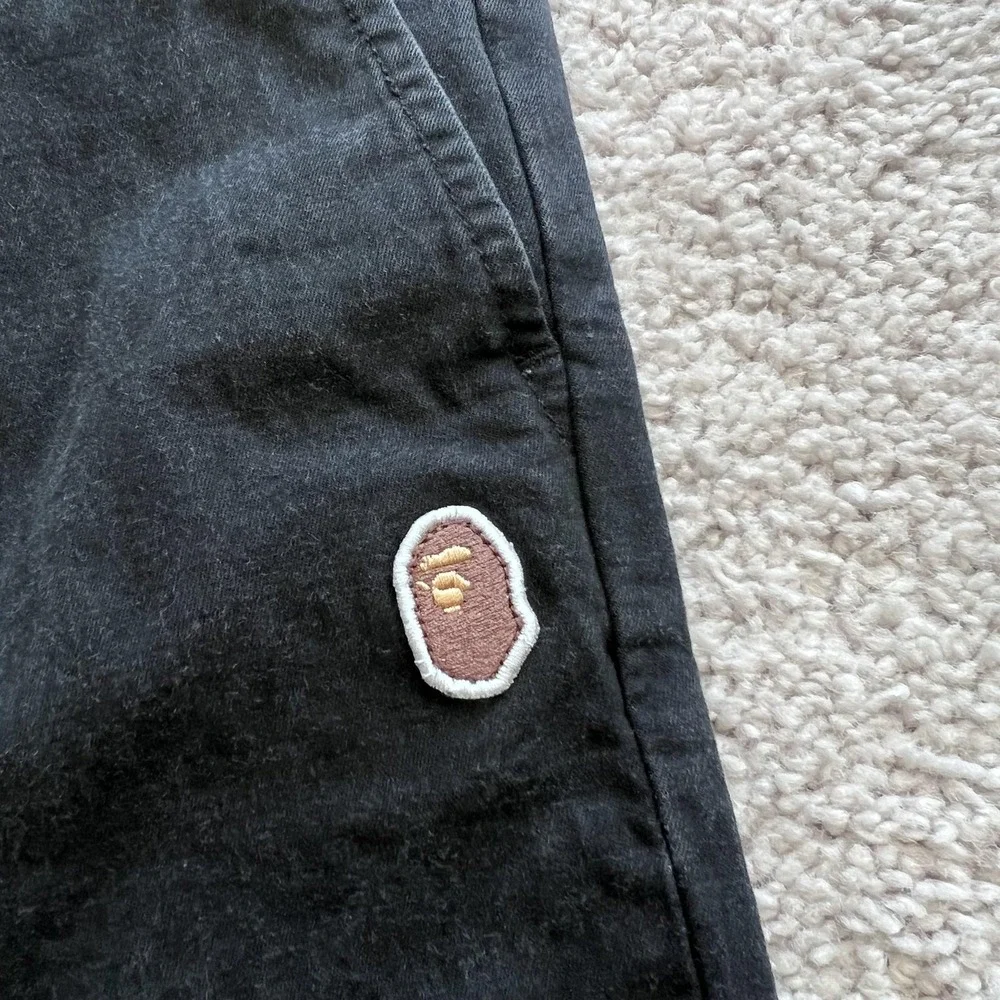 A Bathing Ape Chino Pants Mens M 30x25 Black Pleated Tapered Fit Stretch Logo
